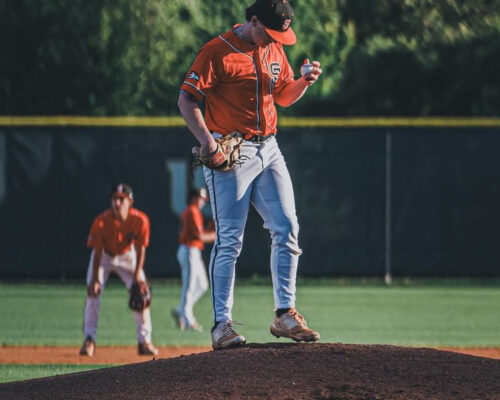 3 Men on baseball field
