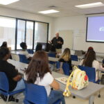students in class listening to the instructor