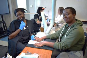 Fall Festival at Comtech. Manicurist.