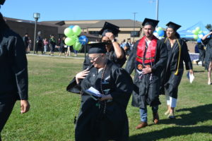 Traven Monroe receives degree during 2022 graduation ceremony