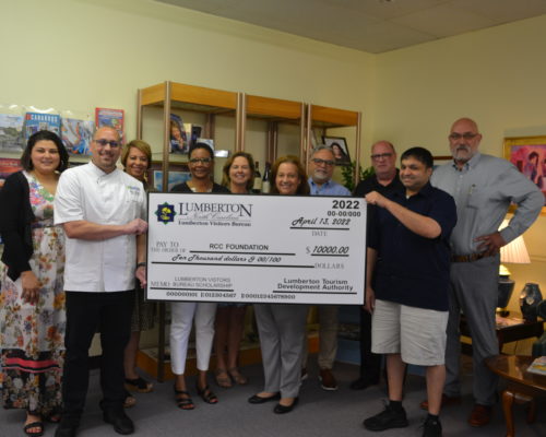 Photos from check presentation at Lumberton Visitor's Bureau