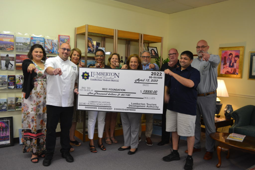 Photos from check presentation at Lumberton Visitor's Bureau