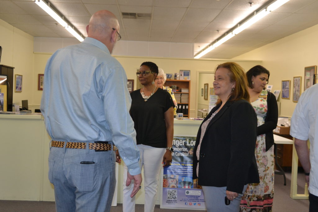 Photos from check presentation at Lumberton Visitor's Bureau