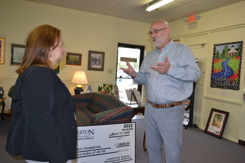 Photos from check presentation at Lumberton Visitor's Bureau