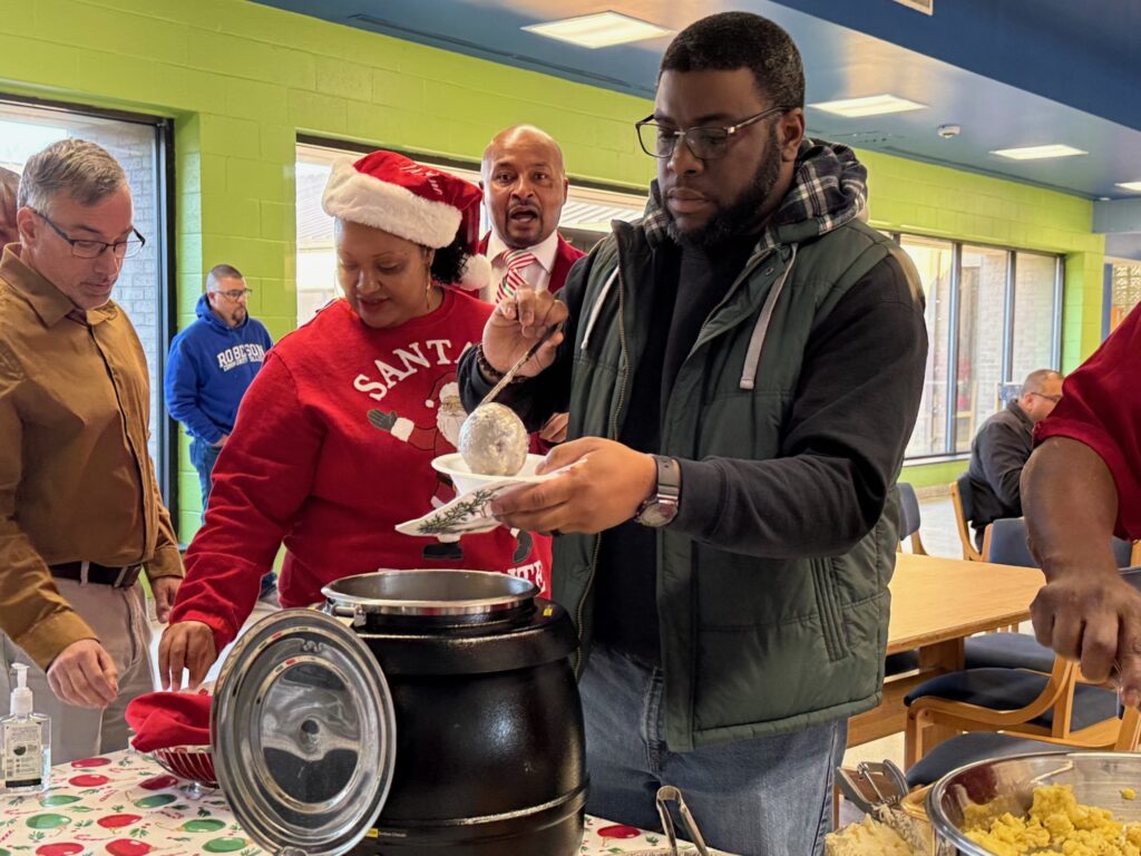 President’s Office hosts ‘Grits and Good Tidings’ breakfast for RCC employees