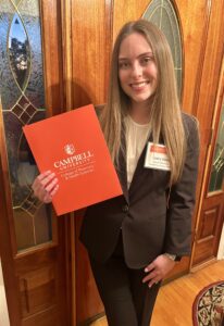 Casey Davis holds folder reading Campbell University. RCC’s short-term training helps Casey Davis land a $20,000 Scholarship