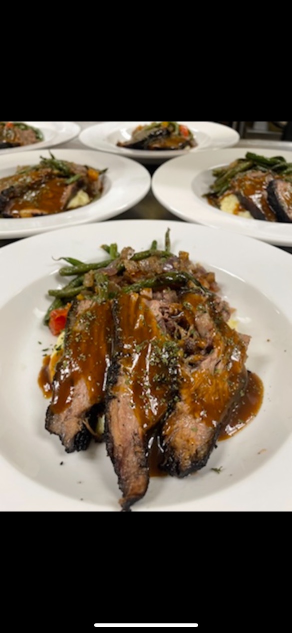 RCC honors its Board of Trustees with holiday meal prepared by culinary students