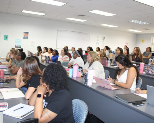 Nursing students listen attentively in class
