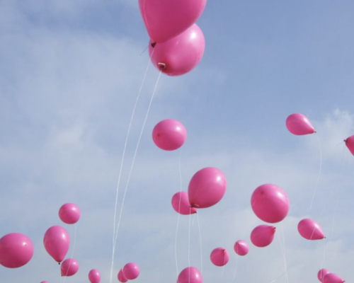 pink balloons blue sky