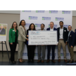 check presentation from Village Family Dental to the RCC foundation
