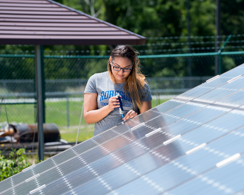 Student working on Solar Panel