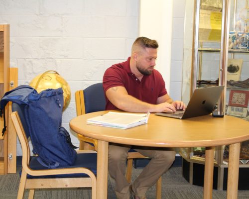 Student at table