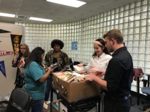 PTK students sorting books at book drive