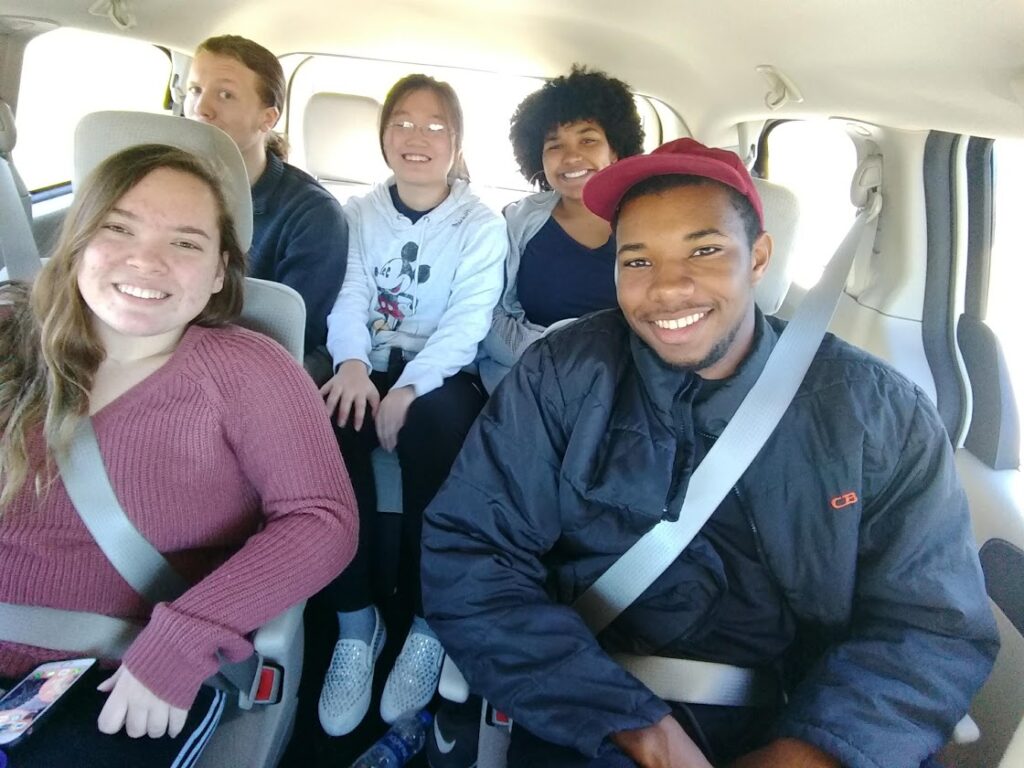 students riding to eat