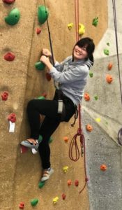 student climbing